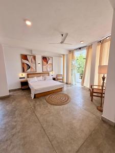 Ένα ή περισσότερα κρεβάτια σε δωμάτιο στο OLA Tangalle +26 φωτογραφίες