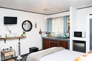 TV a/nebo společenská místnost v ubytování blanc haus