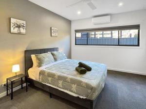 Postel nebo postele na pokoji v ubytování Farrall Solara