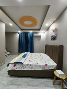 En eller flere senge i et værelse på Homestay Phuc An A5-57