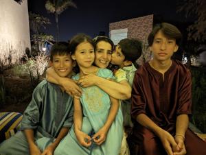 a group of young people posing for a picture at Dar Beynana in Sidi Bibi