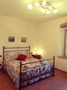 Voodi või voodid majutusasutuse Casa ai Carfini toas