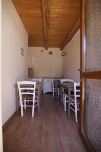 Reštaurácia alebo iné gastronomické zariadenie v ubytovaní La Pepanella