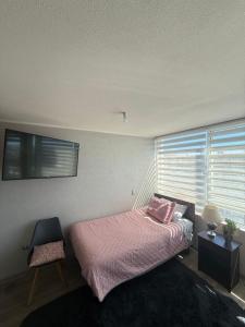 En eller flere senge i et værelse på Vista Urbana y Laguna Concepción