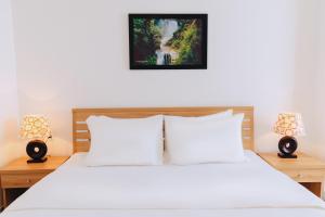 Ένα ή περισσότερα κρεβάτια σε δωμάτιο στο Hotel De Decembre