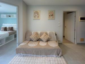 Giường trong phòng chung tại Condo for rent chalong rawai 106