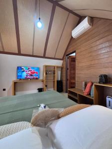 Postel nebo postele na pokoji v ubytování Kubotique Beachfront Staycation