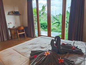 Ένα ή περισσότερα κρεβάτια σε δωμάτιο στο Private Pool Villa in Balian River Hideaway +27 φωτογραφίες