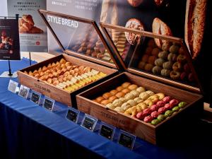 three boxes of different types of fruit on a table at Osaka Ebisu Hotel in Osaka