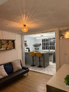 Køkken eller tekøkken på Villa Napoli Apartment Suites