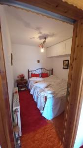 Postel nebo postele na pokoji v ubytování Ξενών ΗΧΩ