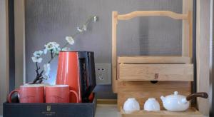 Příslušenství pro přípravu čaje a kávy v ubytování Echeng Hotel Nanning the Mixc Convention + 4 fotografie