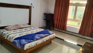 Postel nebo postele na pokoji v ubytování Richmond Hill