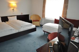 Hotel Engelberg "mein Trail Hotel"客房内的一张或多张床位