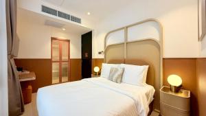 En eller flere senge i et værelse på SOCIAL on Mayo + 29 billeder