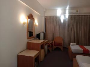 TV a/nebo společenská místnost v ubytování Pailyn Hotel