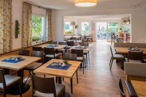 Reštaurácia alebo iné gastronomické zariadenie v ubytovaní Wellenhof Bodensee