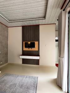 Et tv og/eller underholdning på Nyoman Guest House