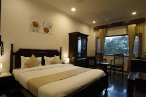 Giường trong phòng chung tại HnM-The Boutique Hotel, Udaipur