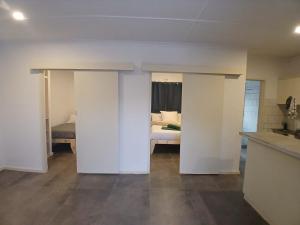 Postel nebo postele na pokoji v ubytování Kliprivier Park Tulbagh