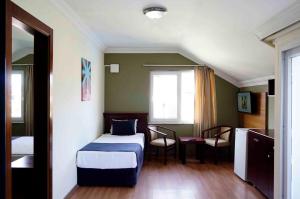 Giường trong phòng chung tại Sunlight Garden Hotel +41 ảnh