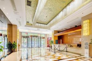 Kuchyň nebo kuchyňský kout v ubytování Jiaxing Fortune Holiday Hotel