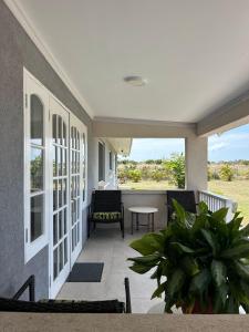 En balkon eller terrasse på Hope Winds - by ZenBreak
