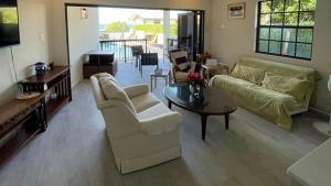 Zona d'estar a Zinnia 7 - by ZenBreak