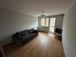 Et opholdsområde på Lakes & Castles Apartment