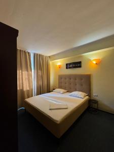 Postel nebo postele na pokoji v ubytování BT City Hotel + 62 fotografií