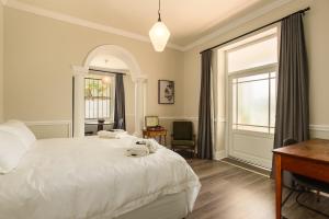 En eller flere senge i et værelse på Story Haus