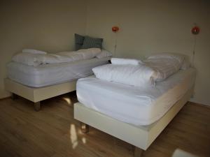 Postel nebo postele na pokoji v ubytování Saltvík Farm Guesthouse