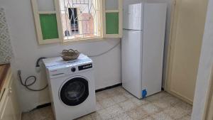 Η κουζίνα ή μικρή κουζίνα στο Gemütliches Zimmer in Douz - Oase der Ruhe