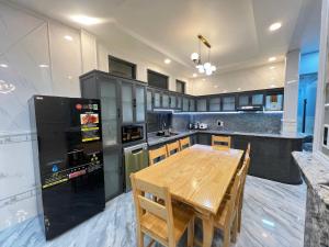 Kuchyň nebo kuchyňský kout v ubytování Chăn Ấm Đệm Êm Homestay