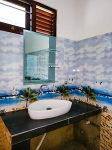 Ένα μπάνιο στο Oni Omi Vlla Hikkaduwa