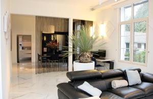 Area lounge atau bar di Luxury Apartments Arendshof