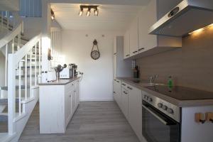 Nhà bếp/bếp nhỏ tại LT35a Huus SoLi +10 ảnh