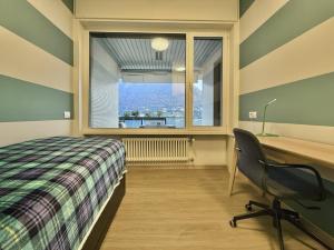 Ένα ή περισσότερα κρεβάτια σε δωμάτιο στο Lakeviewcabin - Apartment With Lake View