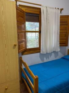 En eller flere senge i et værelse på Casas Rurales La Navela + 41 billeder