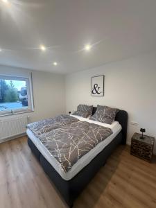 Postel nebo postele na pokoji v ubytování Hivent Ferienwohnungen + 24 fotografií