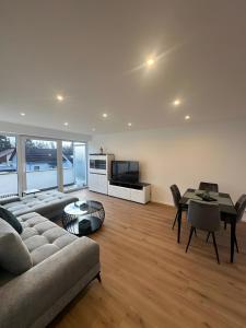 TV a/nebo společenská místnost v ubytování Hivent Ferienwohnungen