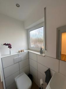 Koupelna v ubytování Hivent Ferienwohnungen