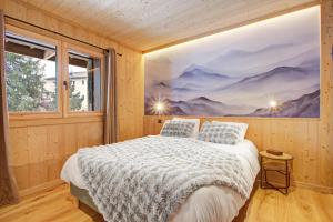 En eller flere senge i et værelse på Chalet Nivaria - Avec Jardin Privé