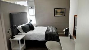 Postel nebo postele na pokoji v ubytování Fern Haven