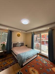 Giường trong phòng chung tại Zen Space