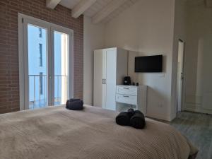 Giường trong phòng chung tại Tiramisù incluso - by Flora