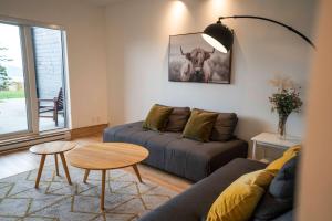 Posezení v ubytování Chic Condo - Stunning View & Quiet + 46 fotografií