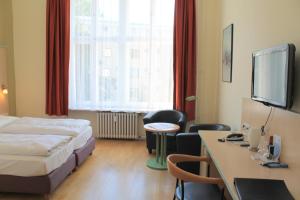 Postel nebo postele na pokoji v ubytování Hotel Hansablick