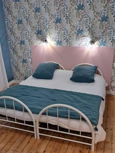 Postel nebo postele na pokoji v ubytování Gîte Lebasladin