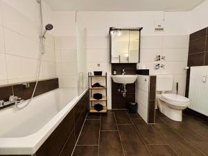 Et badeværelse på Stilvolles Wohlfühl-Apartment nahe Bahnhof